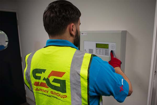 Electrical Contractors in London - Alarm being Tested